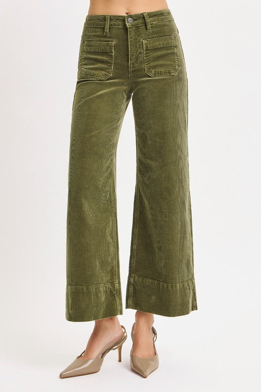 Risen Jeans high rise cropped wide leg corduroy pants in washed moss green showing close up view