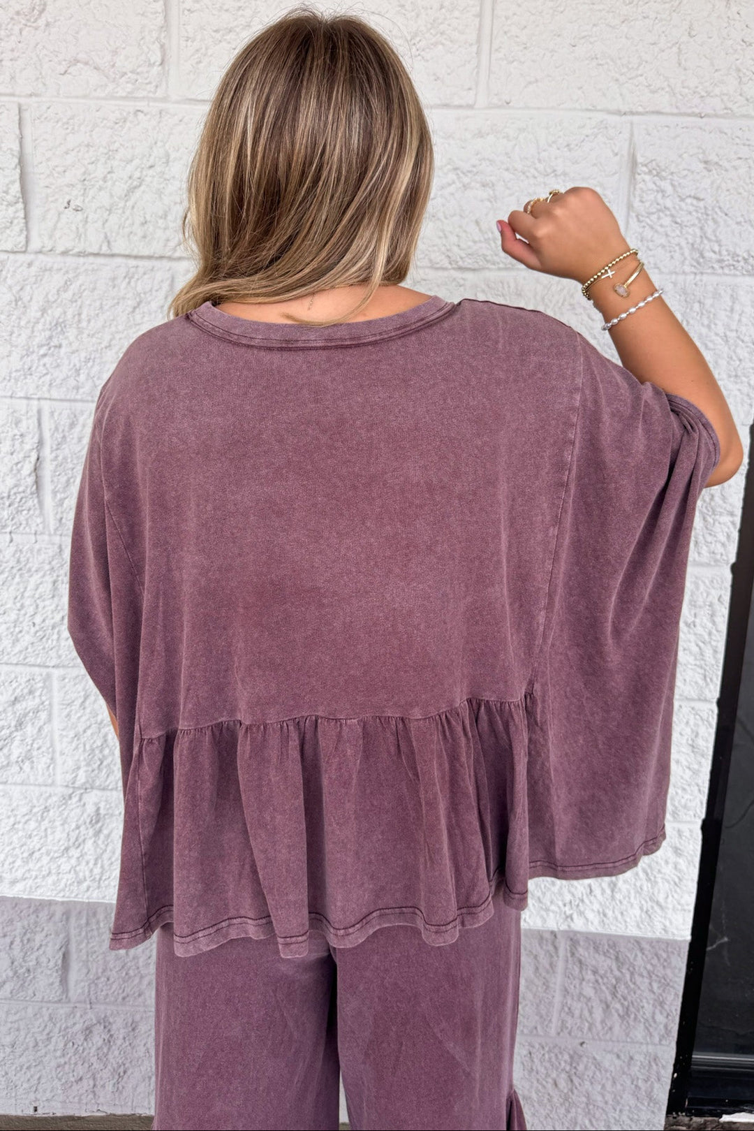 solid washed mulberry dolman sleeve peplum style ruffle hem relaxed silhouette cotton top