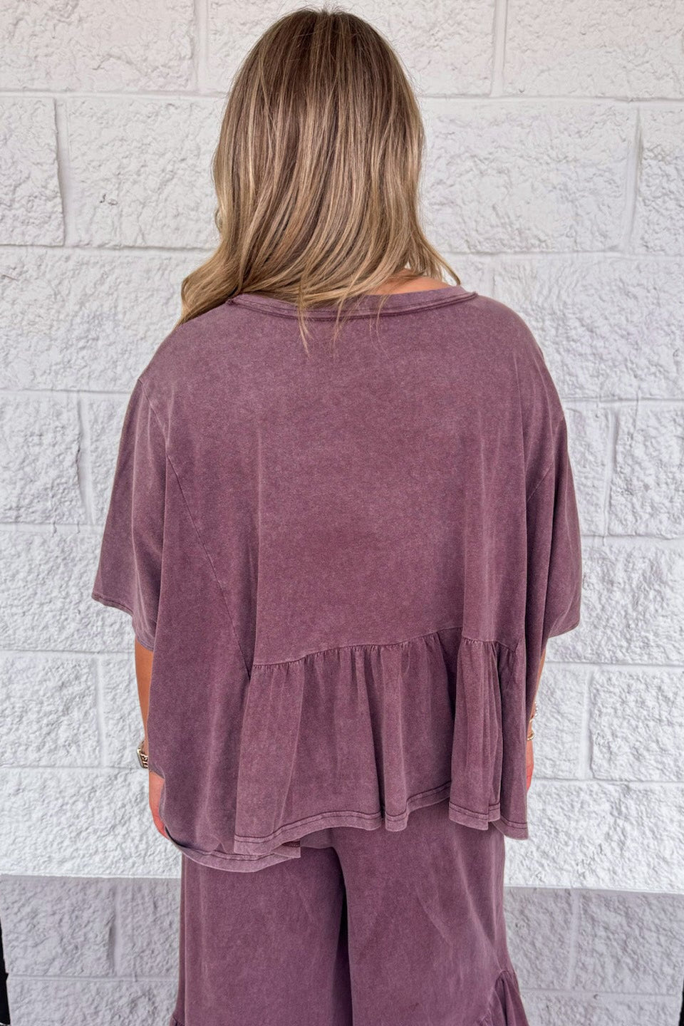 solid washed mulberry dolman sleeve peplum style ruffled bottom hem cotton top