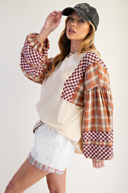Women's slub knit top with plaid print patchwork colorblock by Easel showing side view