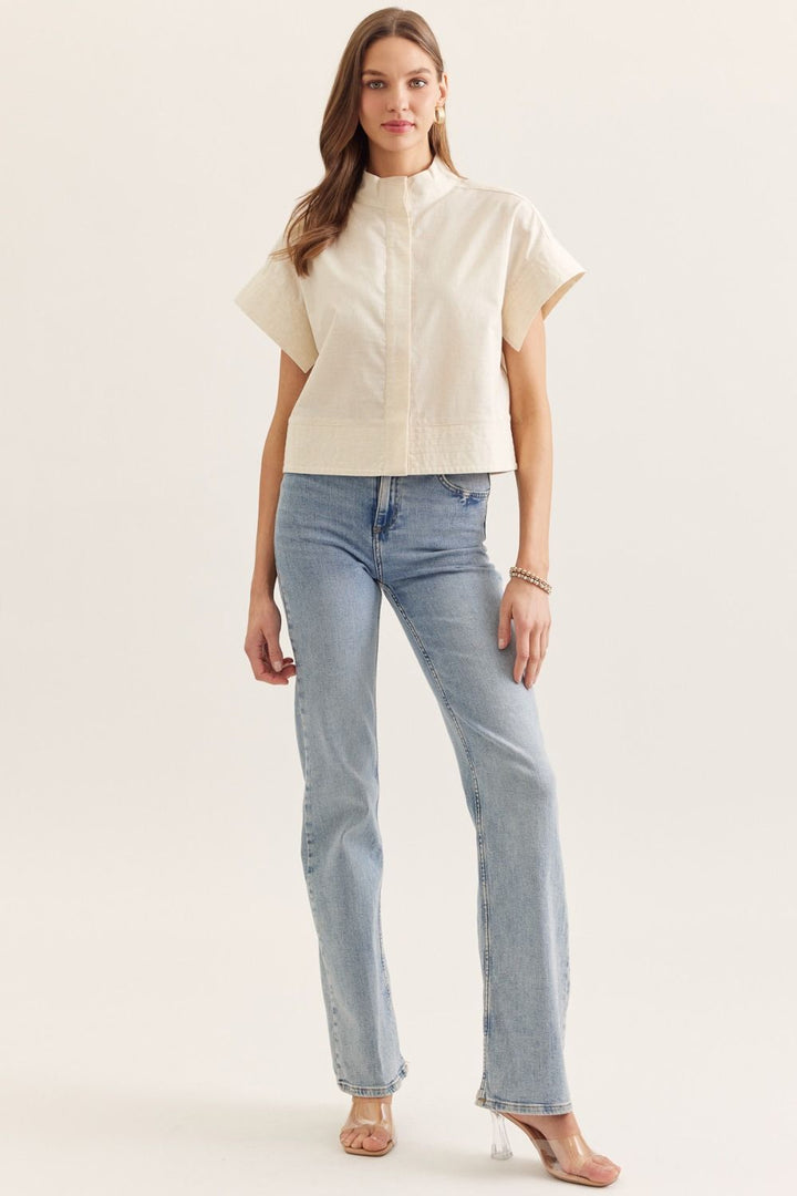 Entro natural cotton linen blend button down short sleeve top styled with denim jeans
