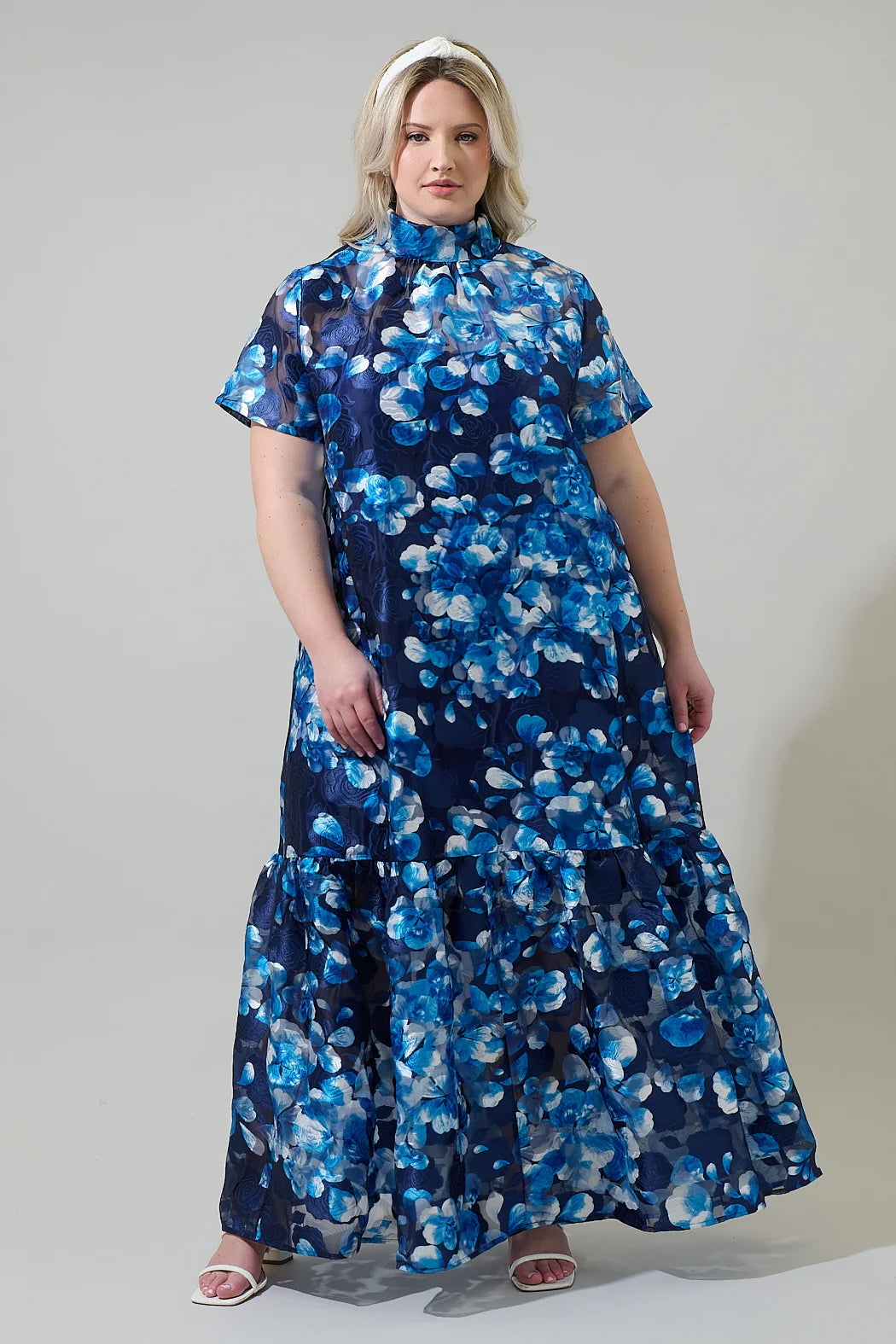 Plus size navy and blue maxi dress with textured floral print and tie detail in back