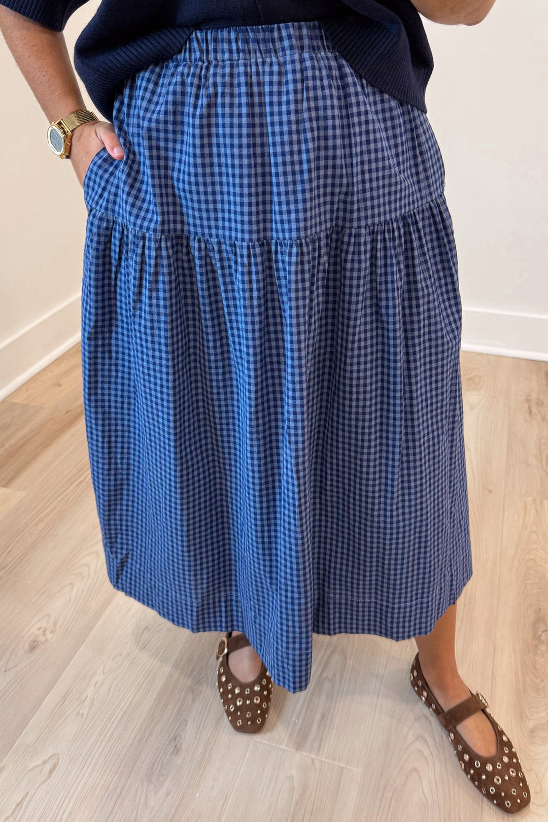 light blue and navy gingham checkered print tiered flowy cotton midi skirt with side pockets