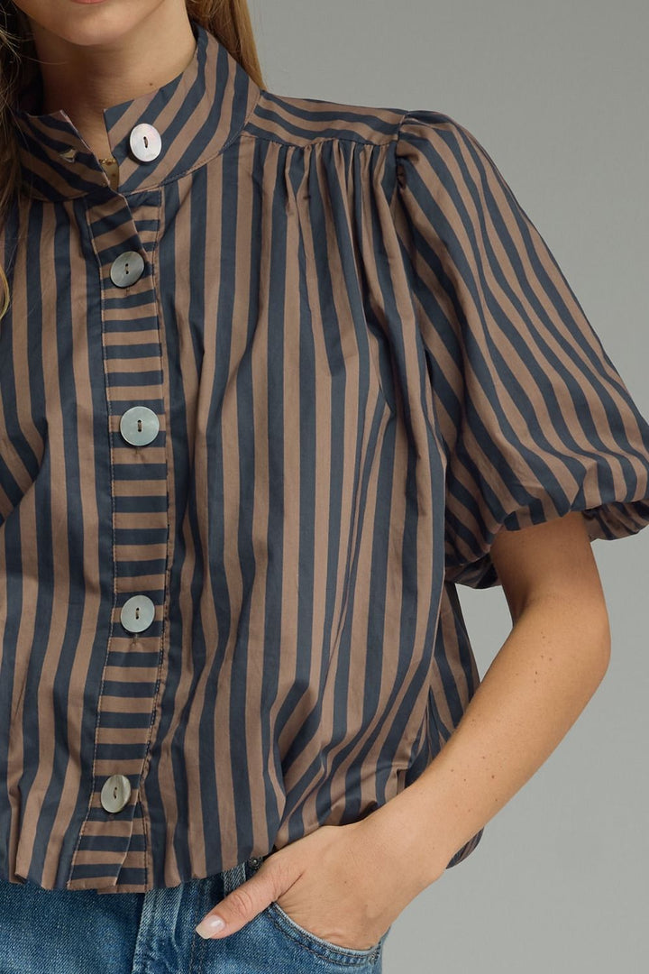 Women's semi-cropped navy and brown striped top with a button front closure and bubble hem