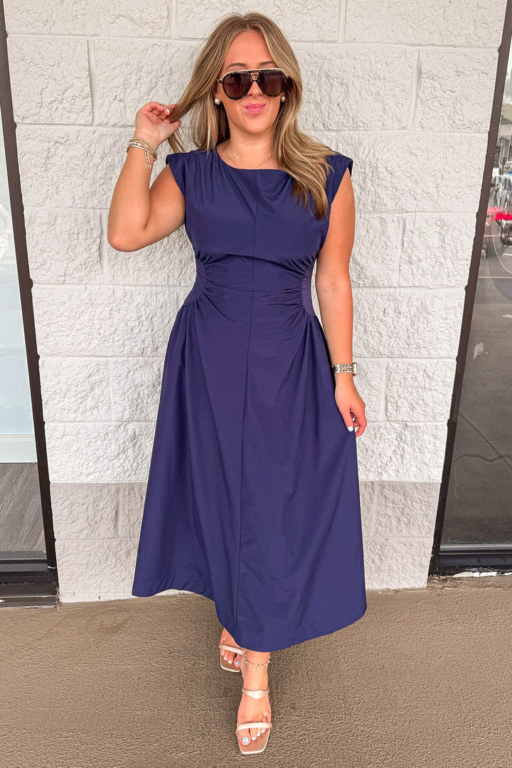 solid navy blue cinched waist sleeveless midi dress