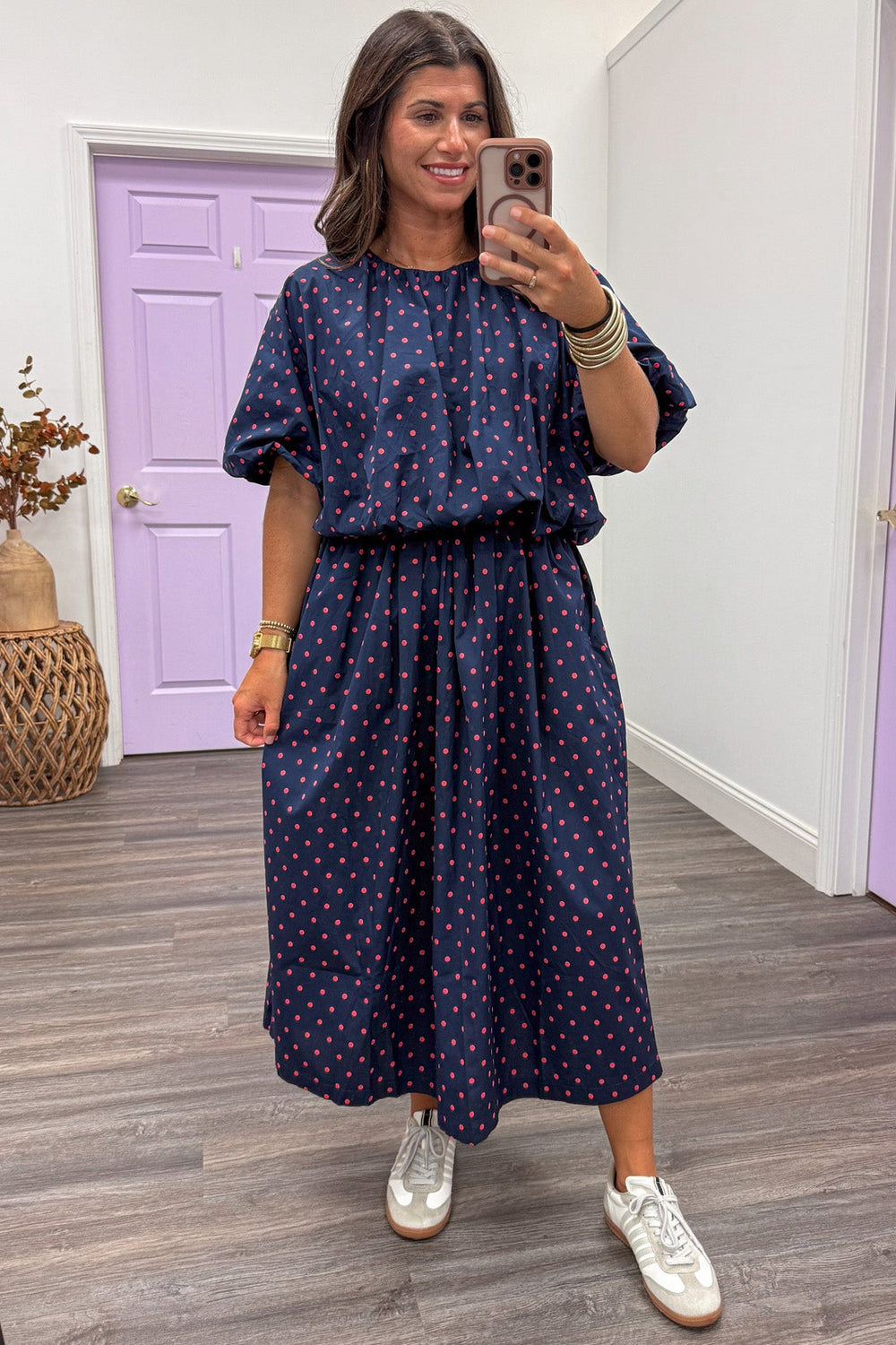 navy blue with coral polka dot print puff sleeve bubble hem semi-cropped cotton top