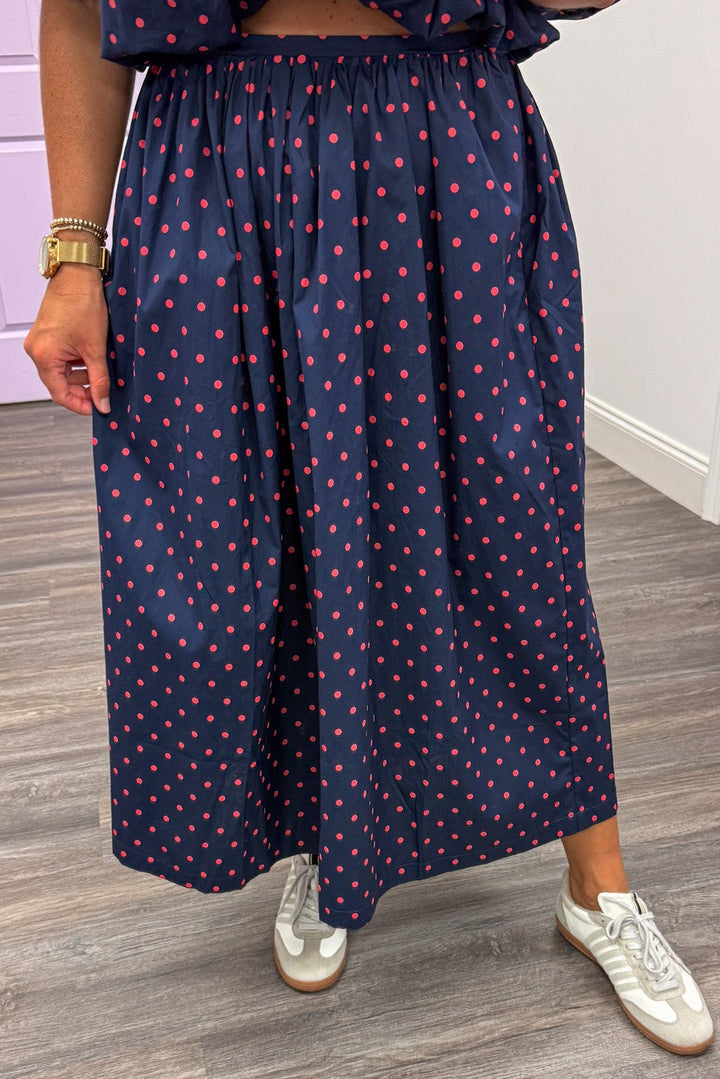 navy blue with coral polka dot print elastic waist relaxed fit cotton poplin midi skirt