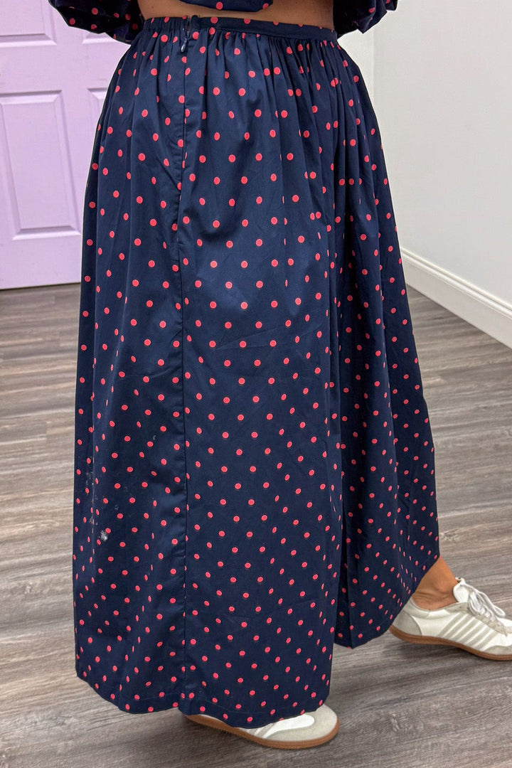 navy blue with coral polka dot print elastic waist cotton poplin midi skirt with side zipper closure