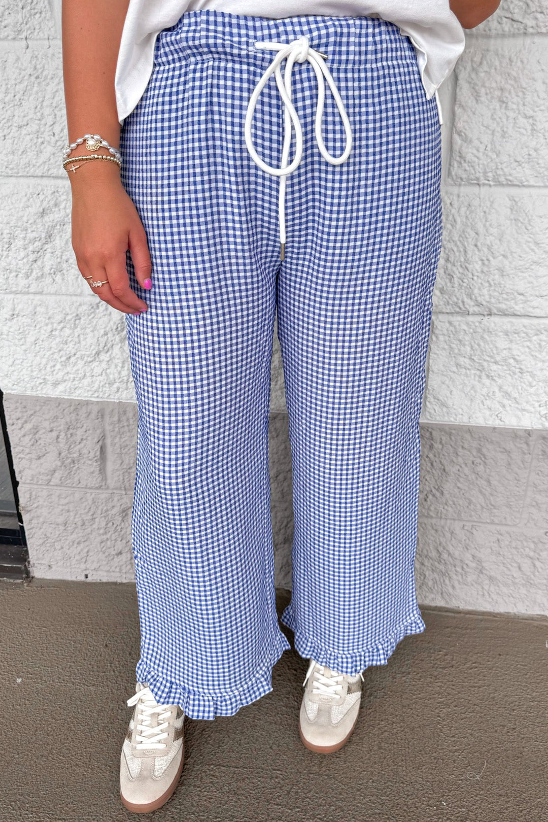 navy blue and ivory gingham checkered print ruffle hem wide leg drawstring pants