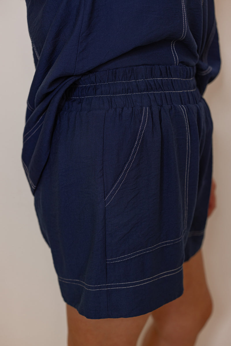 navy blue white stitching elastic waist shorts