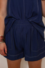 navy blue white stitching elastic waist shorts
