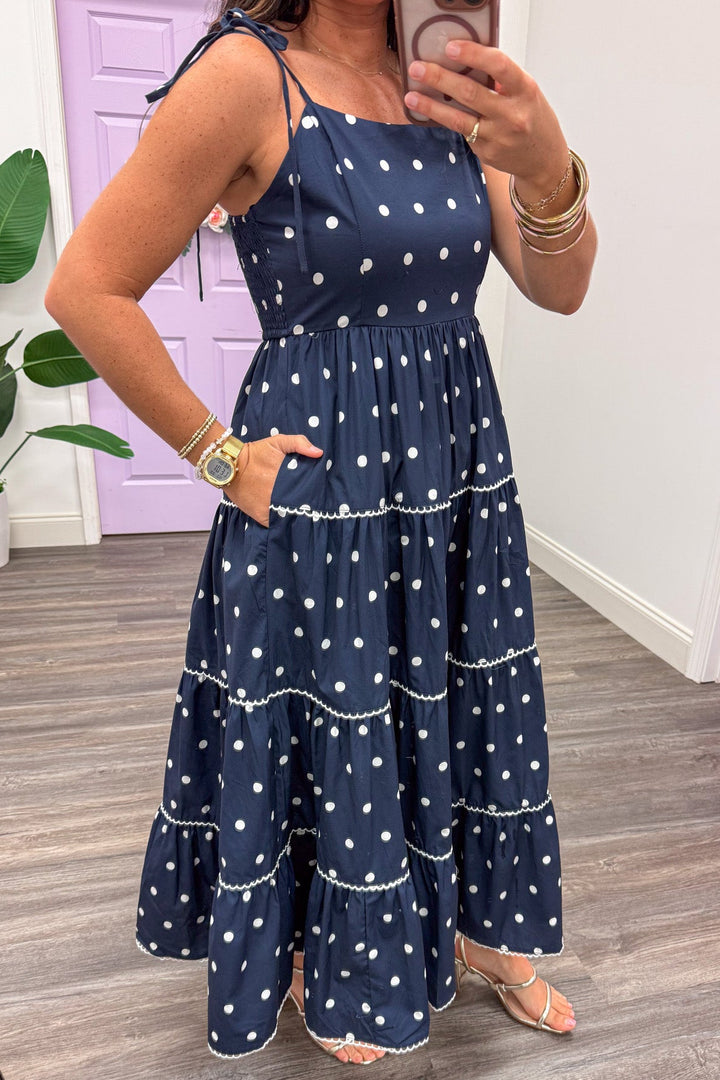 navy with white polka dot print sleeveless tiered midi dress with side pockets