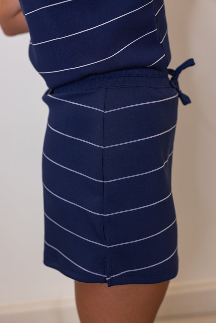 Women's smoky navy and cream striped scuba knit skirt lined with shorts by Rae Mode showing up close side view