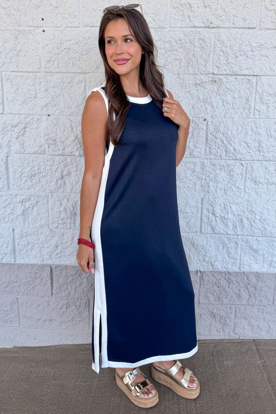 navy with white trim details crew neckline sleeveless scuba knit midi dress