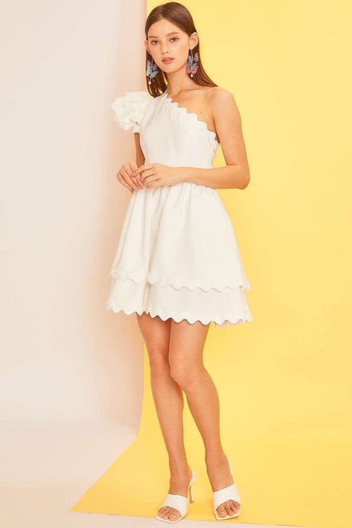 Main Strip Off white one shoulder dress with off white scalloped piping trim