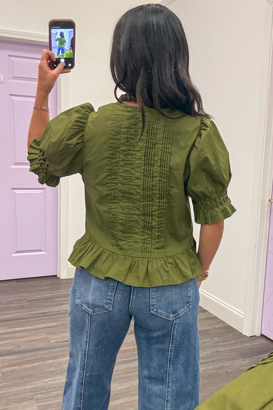 solid olive green button front peplum style semi-cropped cotton poplin top with pintuck details