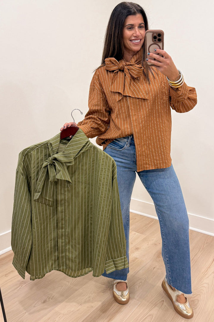 olive green and cream striped mock neck long sleeve flap covered button front closure top
