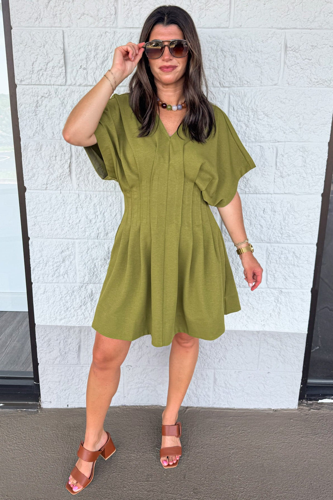 solid olive green dolman sleeve v neckline pleated short dress with pintuck details