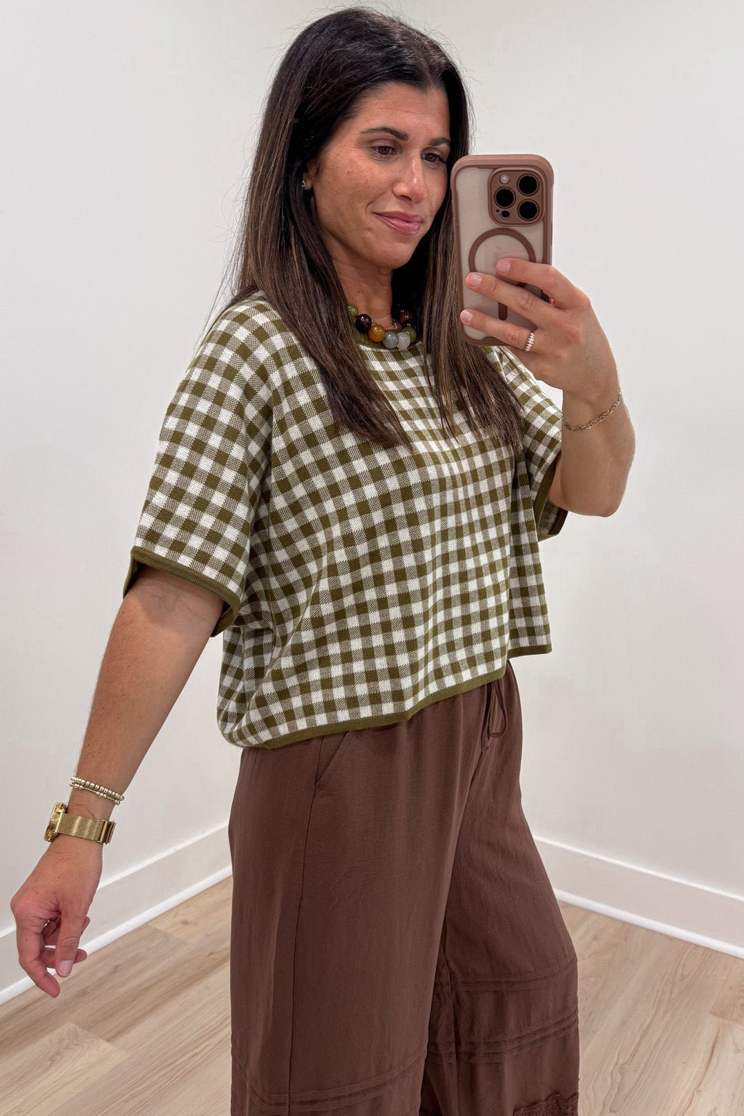olive green and ivory gingham checkered print short sleeve boxy fit semi-cropped knit top