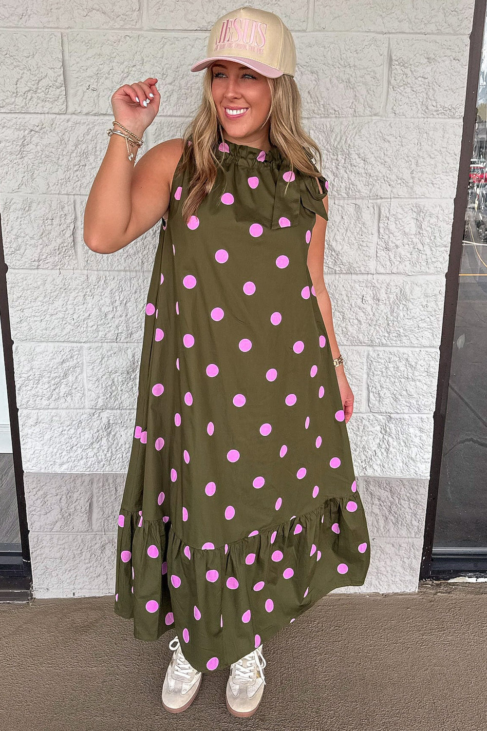 olive green with pink polka dot print sleeveless cinch mock neck midi dress with tiered bottom hem