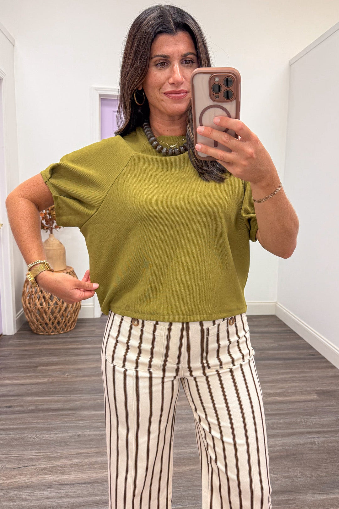 solid light olive green short puff sleeve semi-cropped relaxed silhouette ribbed knit top