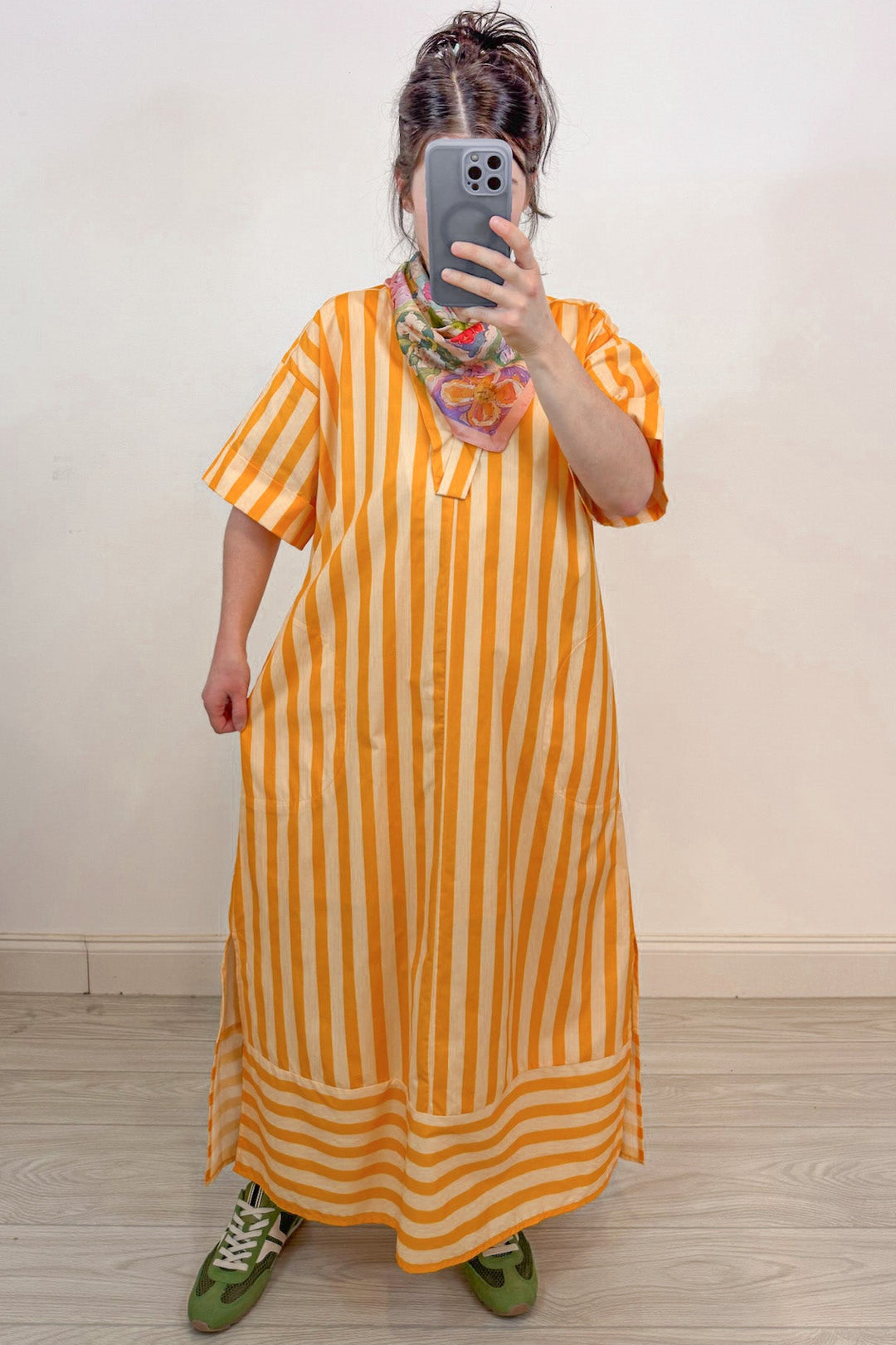 orange and pale peach striped short sleeve midi dress flowy silhouette