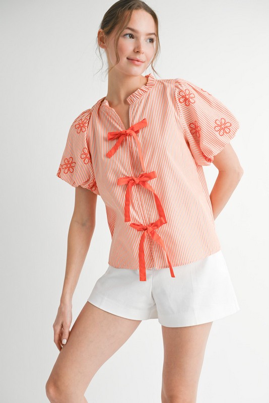 Jodifl Orange and cream striped top with floral accents and bow tie front closure