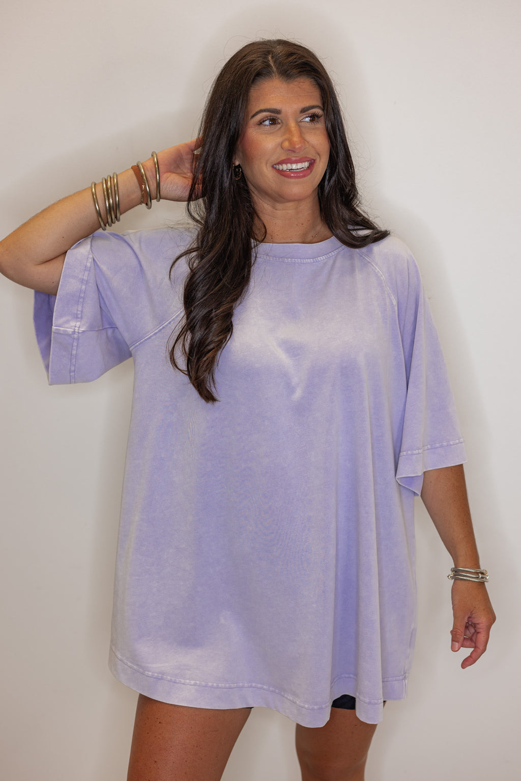 Women's oversized cotton lilac tee shirt, closeup view.