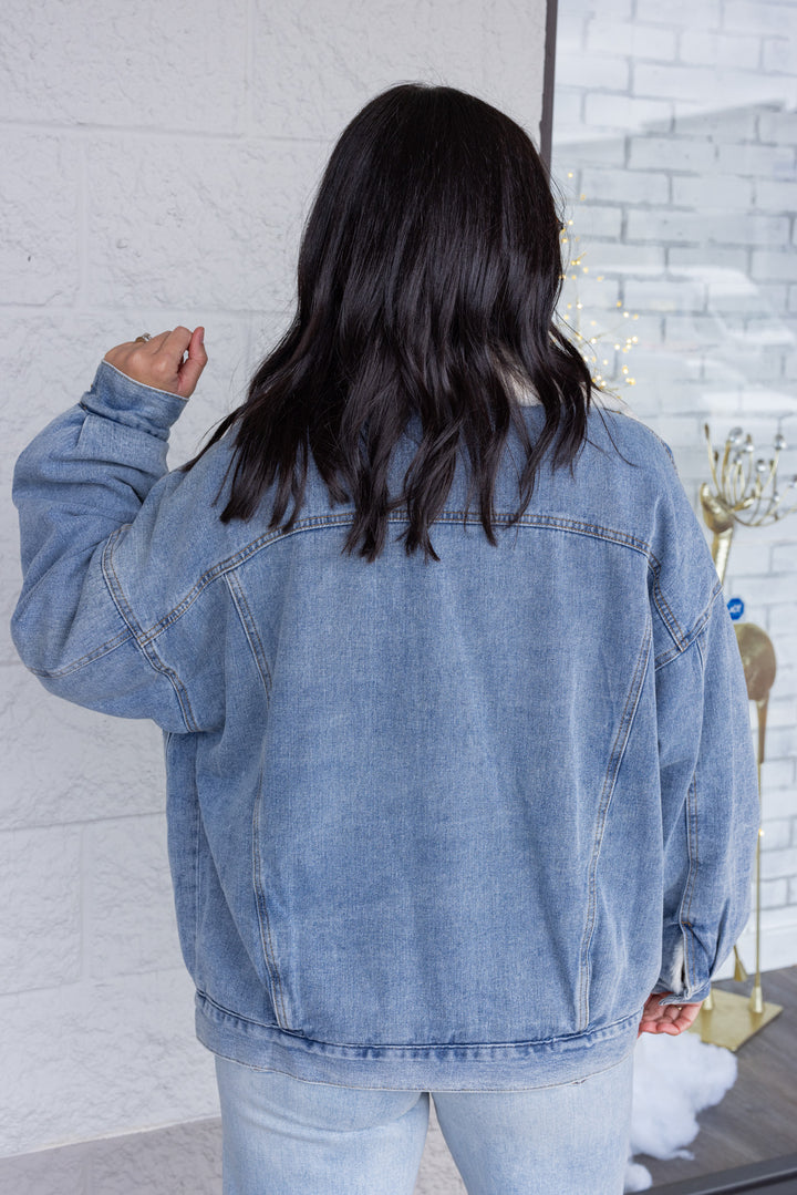 Blue denim jacket with cream faux fur lining by Wishlist showing up close back view