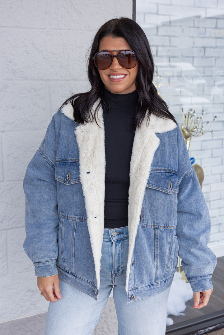 Blue denim jacket with cream faux fur lining by Wishlist