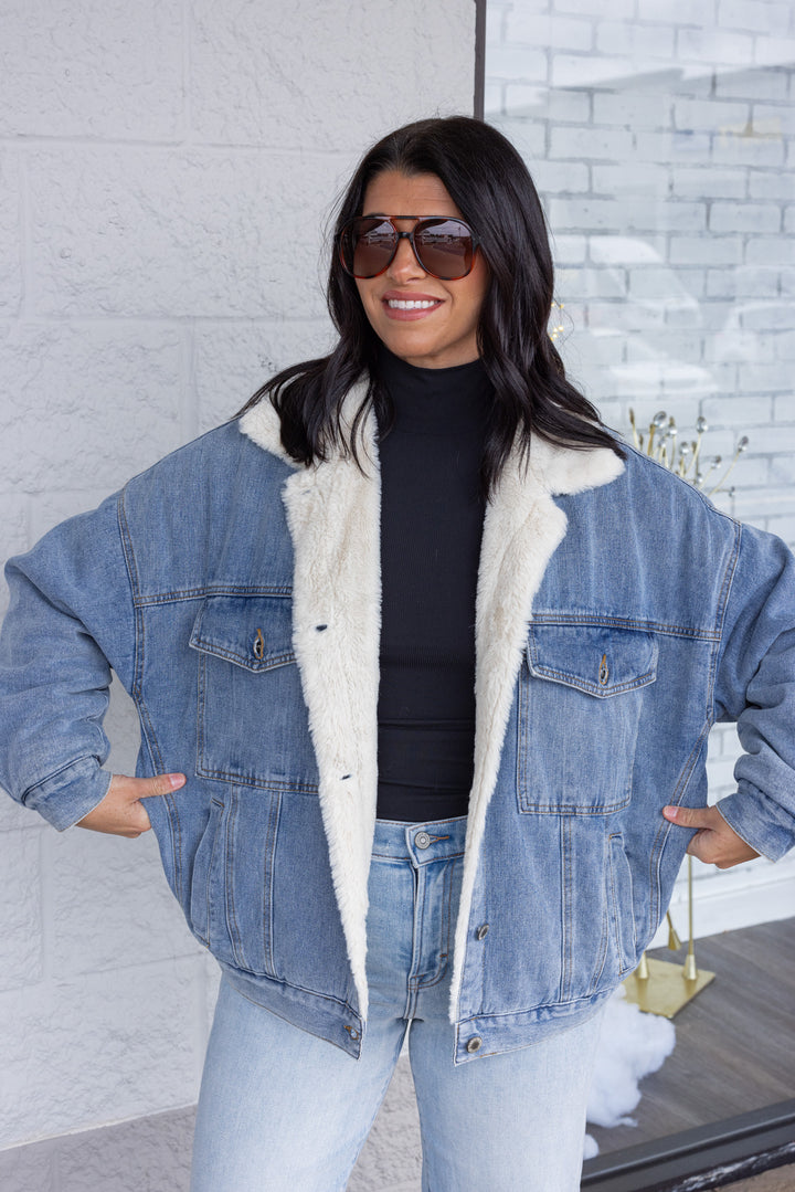 Blue denim jacket with cream faux fur lining by Wishlist showing relaxed fit