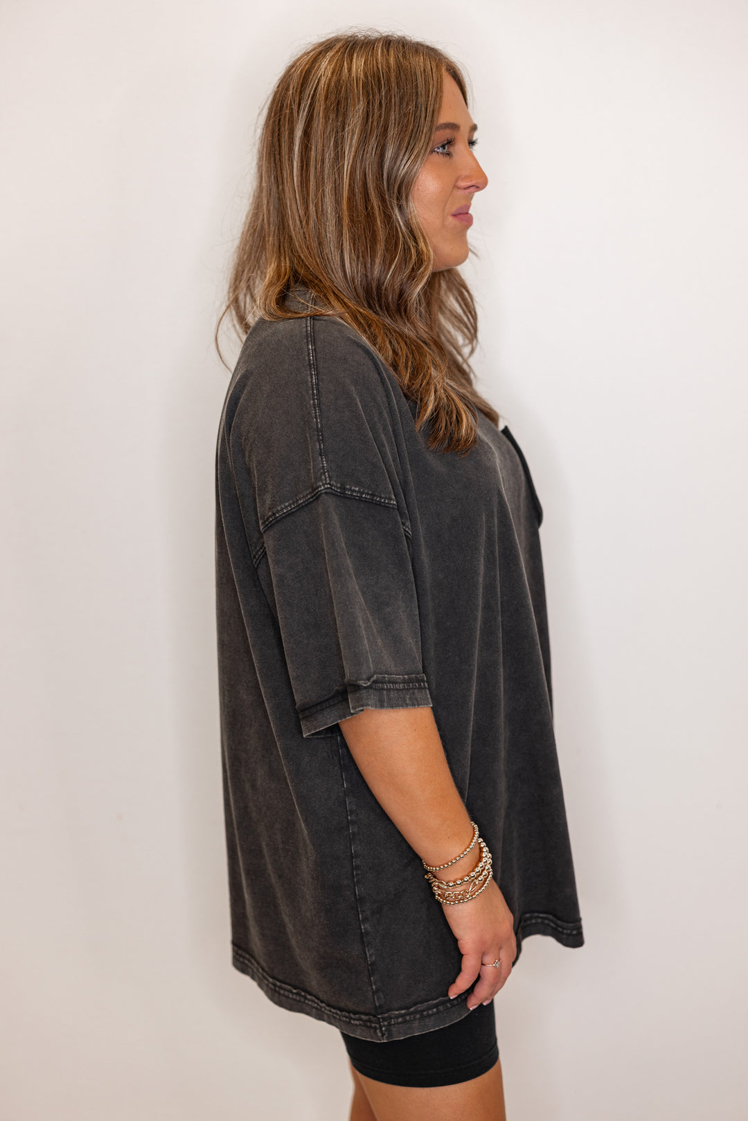 Women's mineral washed black oversized tee by Easel showing up close side view