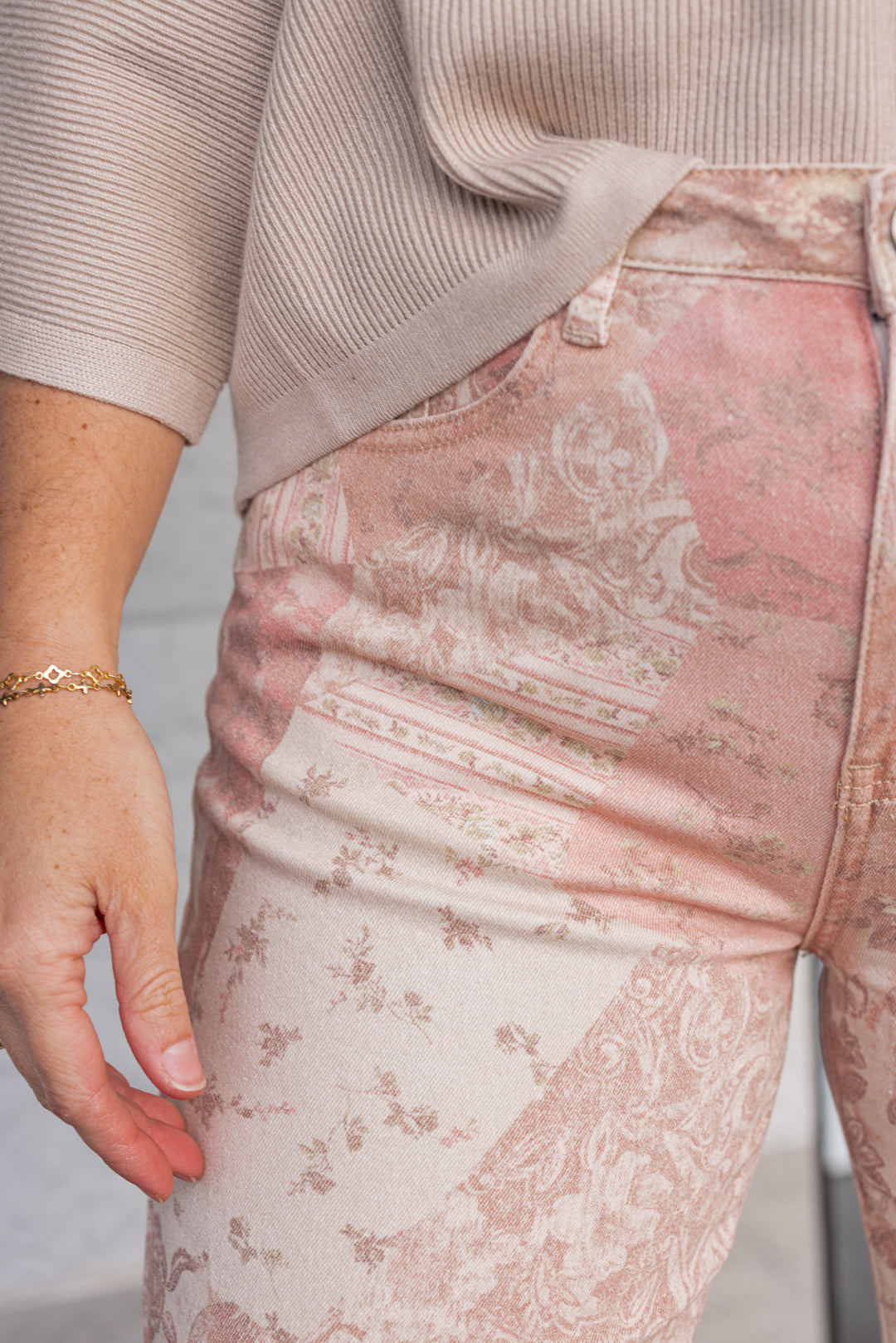 Women's vintage rose pink twill denim pants by Easel showing floral patchwork