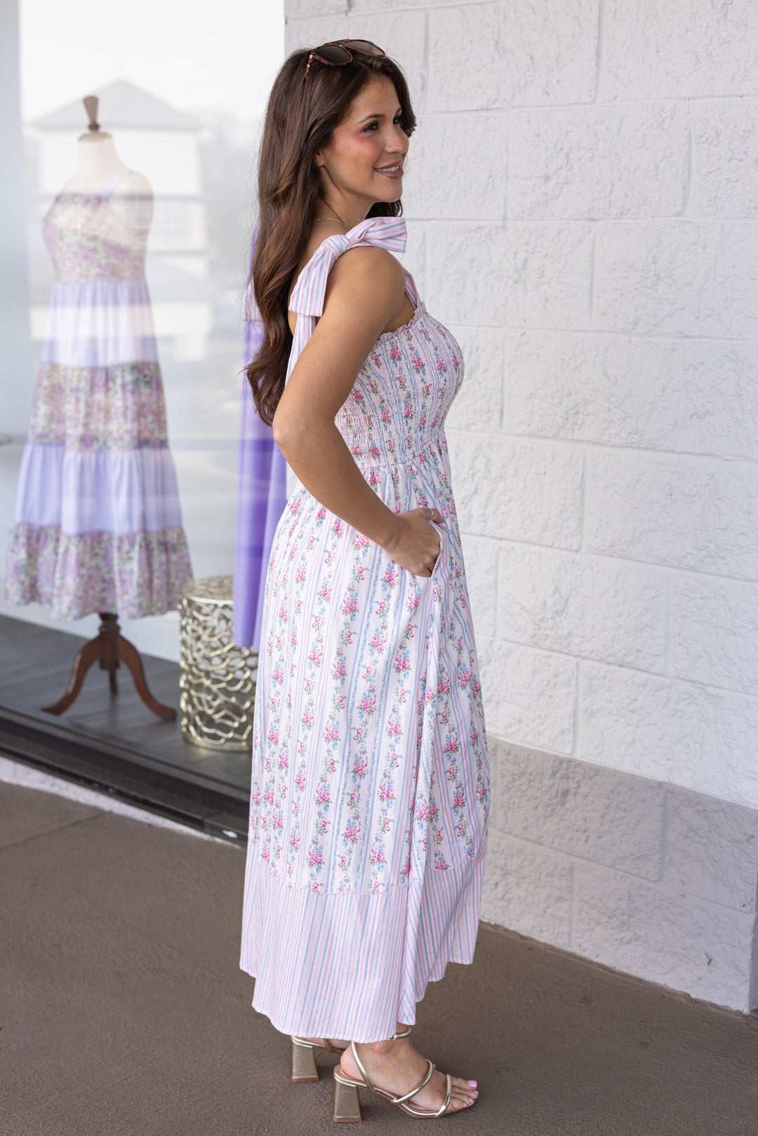 pink and blue floral and striped print sleeveless ruffle trim midi dress side pockets