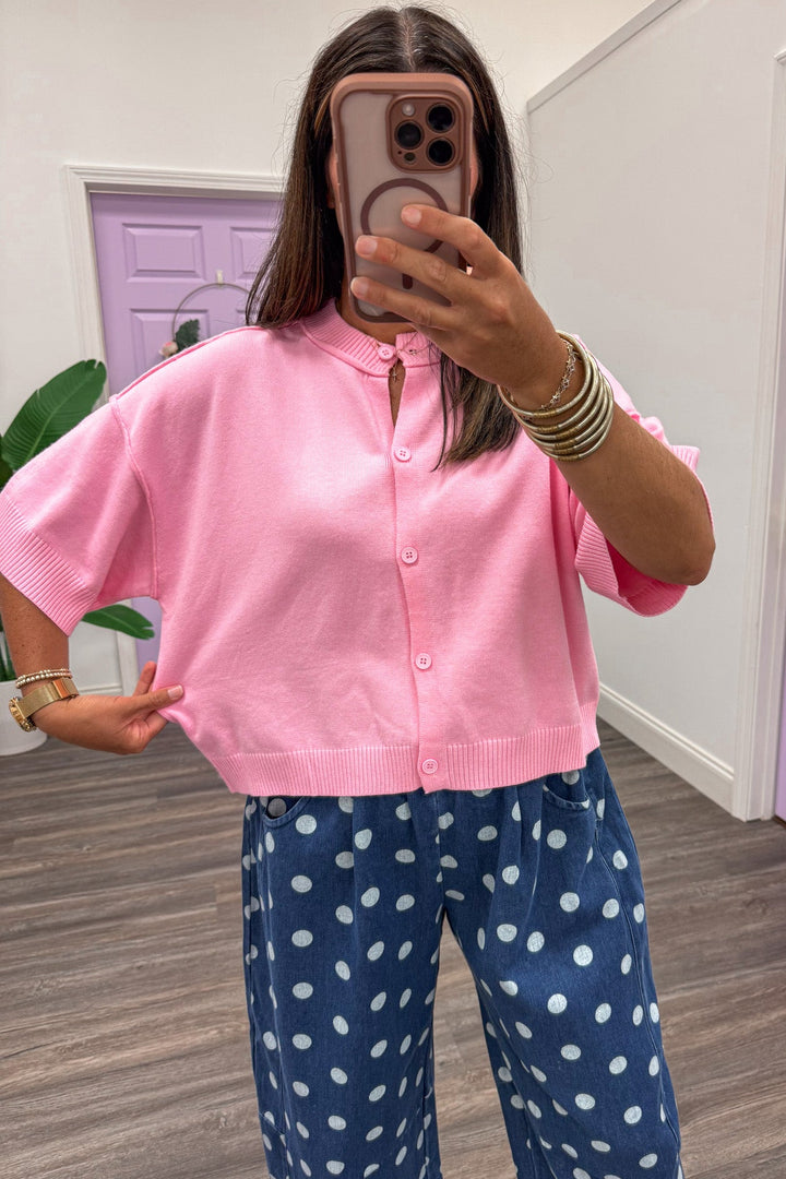 solid light pink button front short sleeve crew neckline relaxed silhouette knit cardigan top