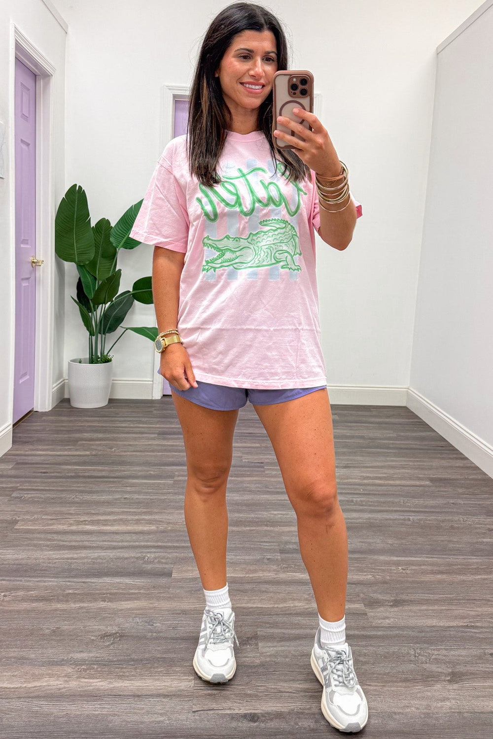 pink with white stripes and green later gator graphic print short sleeve cotton tee