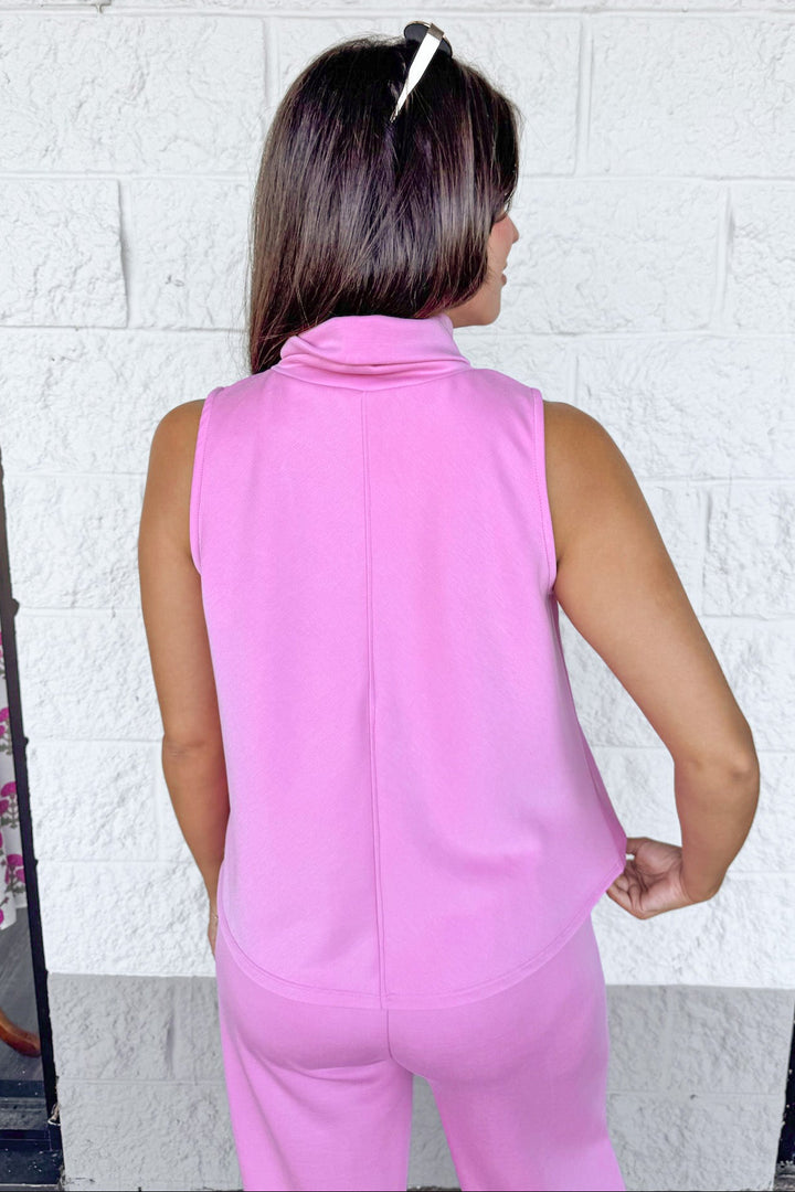 solid pink mock neck sleeveless luxe knit top with reverse seam details back view