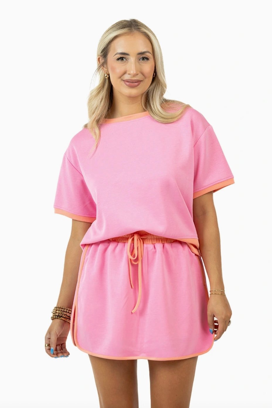 pink and orange matching skort set in plus