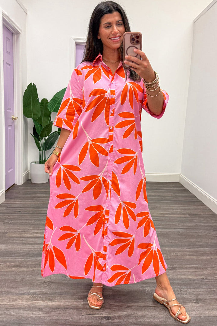 pink with orange and white palm leaf print button front short sleeve relaxed silhouette maxi dress