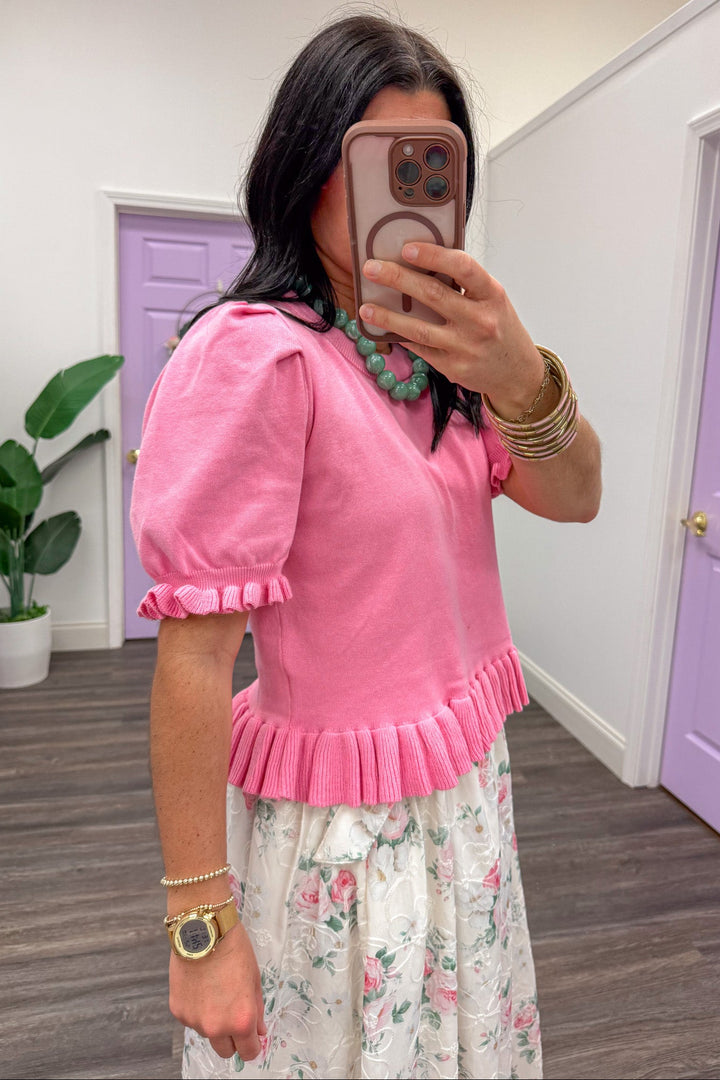 Pink ruffle pleat detail puff sleeve knit top side view