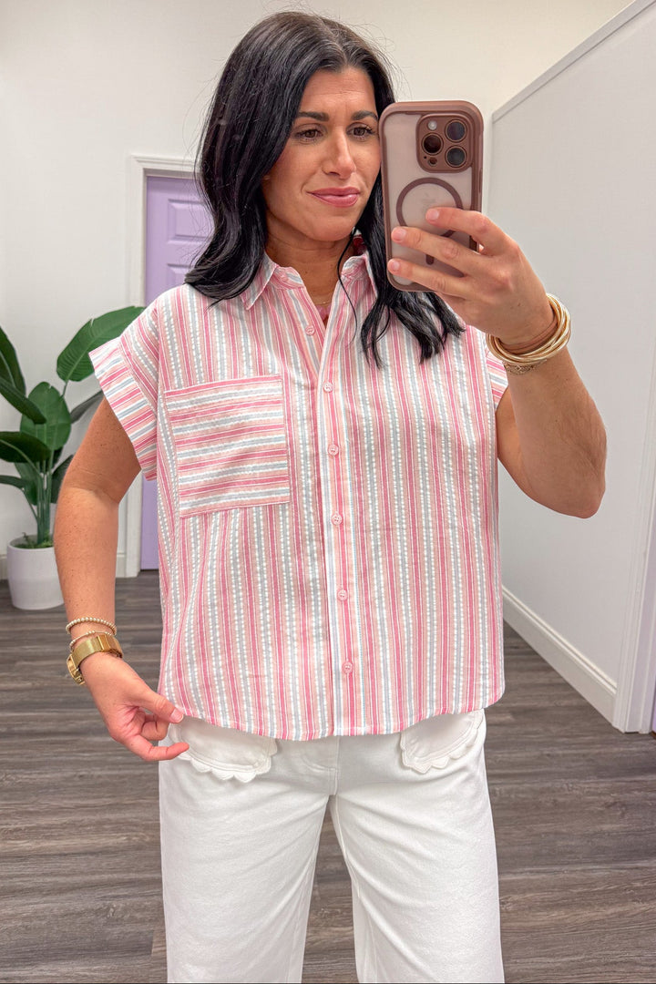 pink and white vertical striped button up cap sleeve blouse with pocket
