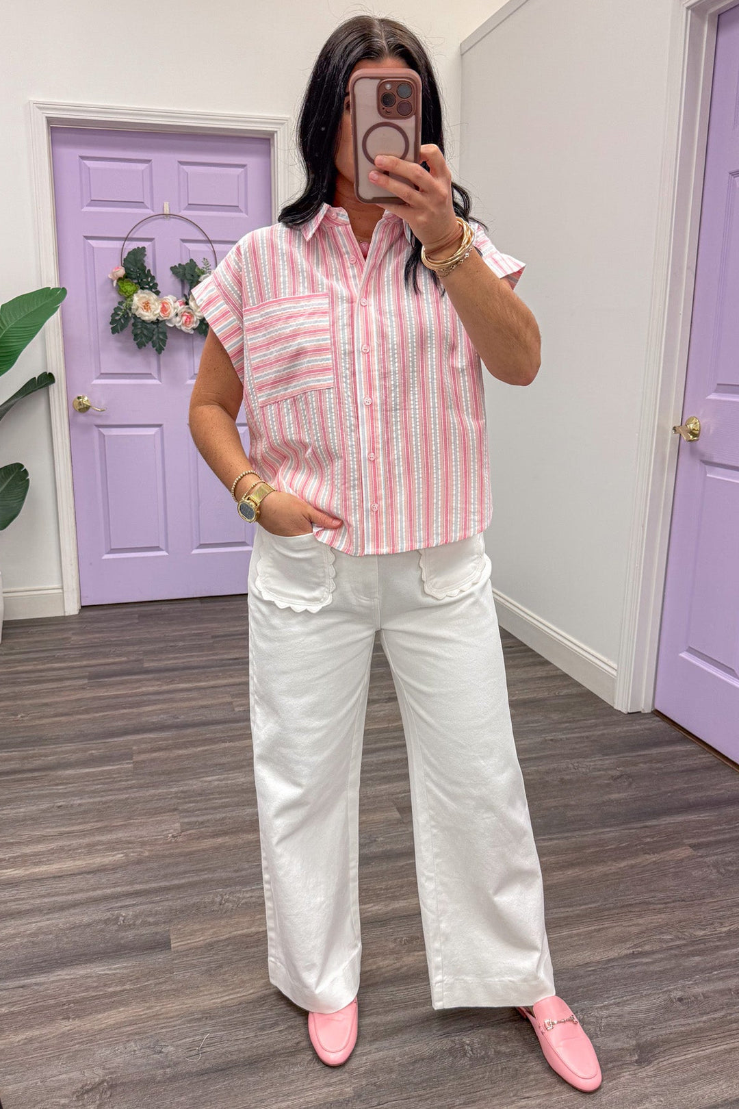 pink and white vertical striped button up cuffed cap sleeve blouse