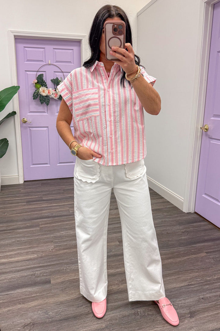 pink and white vertical striped button up cuffed cap sleeve blouse
