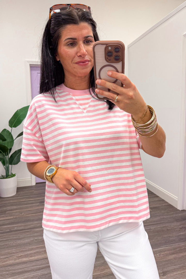 light pink and white horizontal striped drop shoulder short sleeve knit top