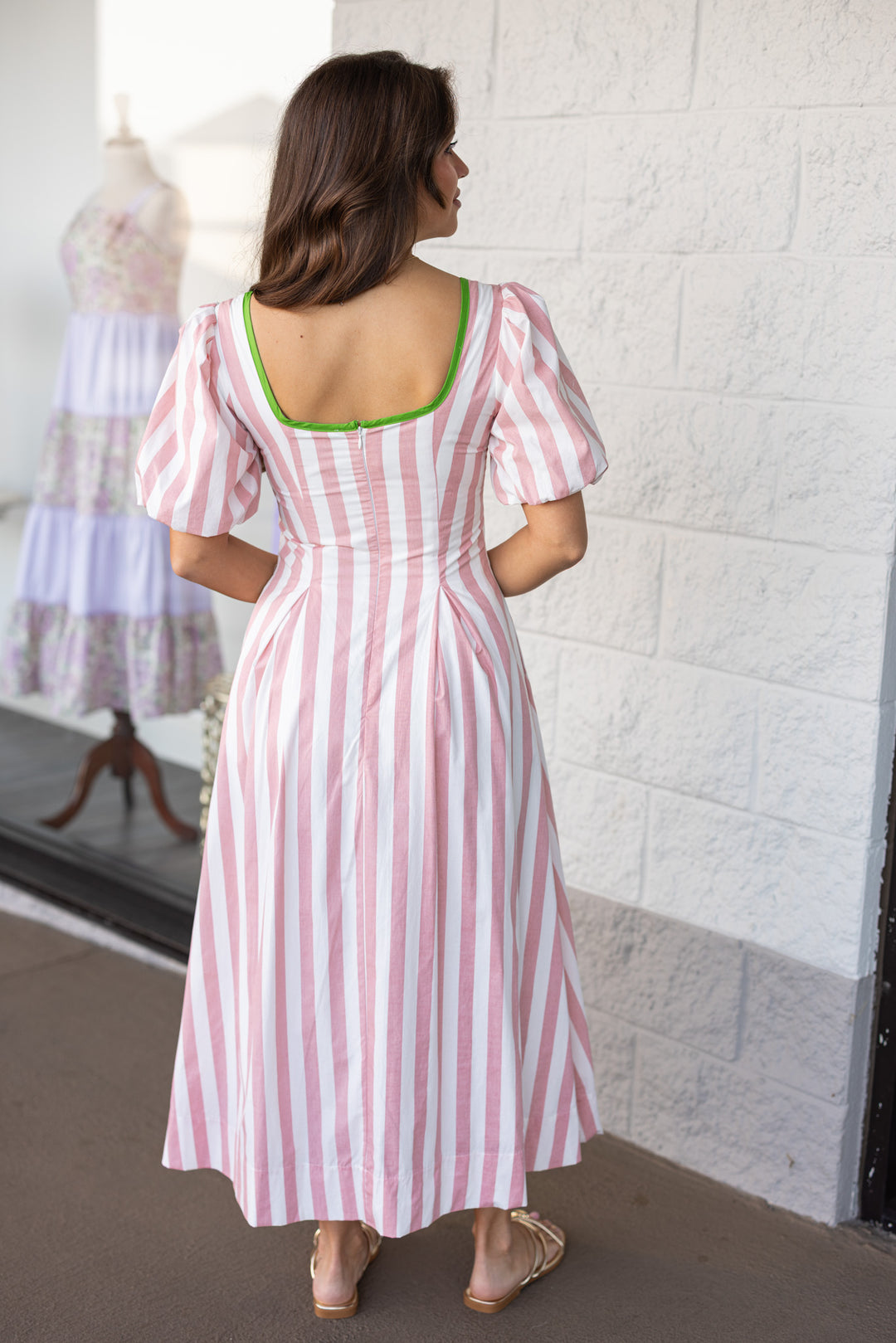 pink and white vertical striped midi dress with green piping trim zipper closure
