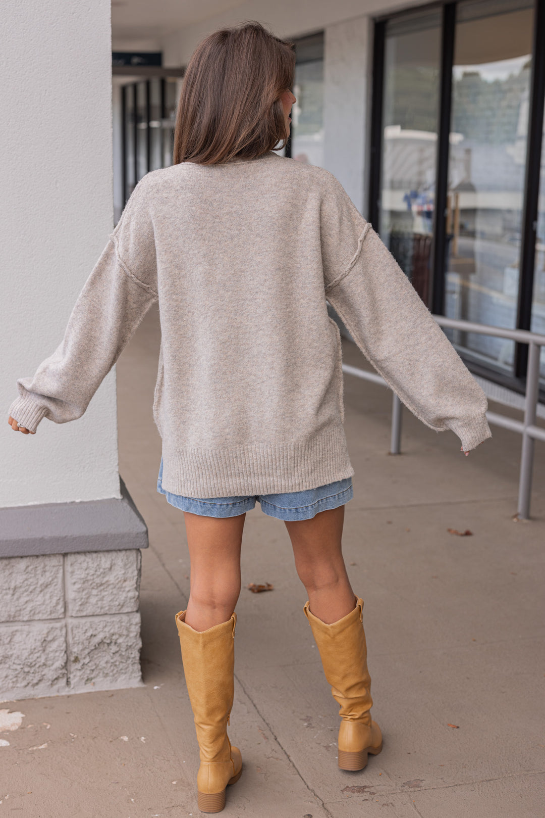 Women's grey knit sweater with a brown plaid pumpkin and cream lace detail on front by Fantastic Fawn showing full back view
