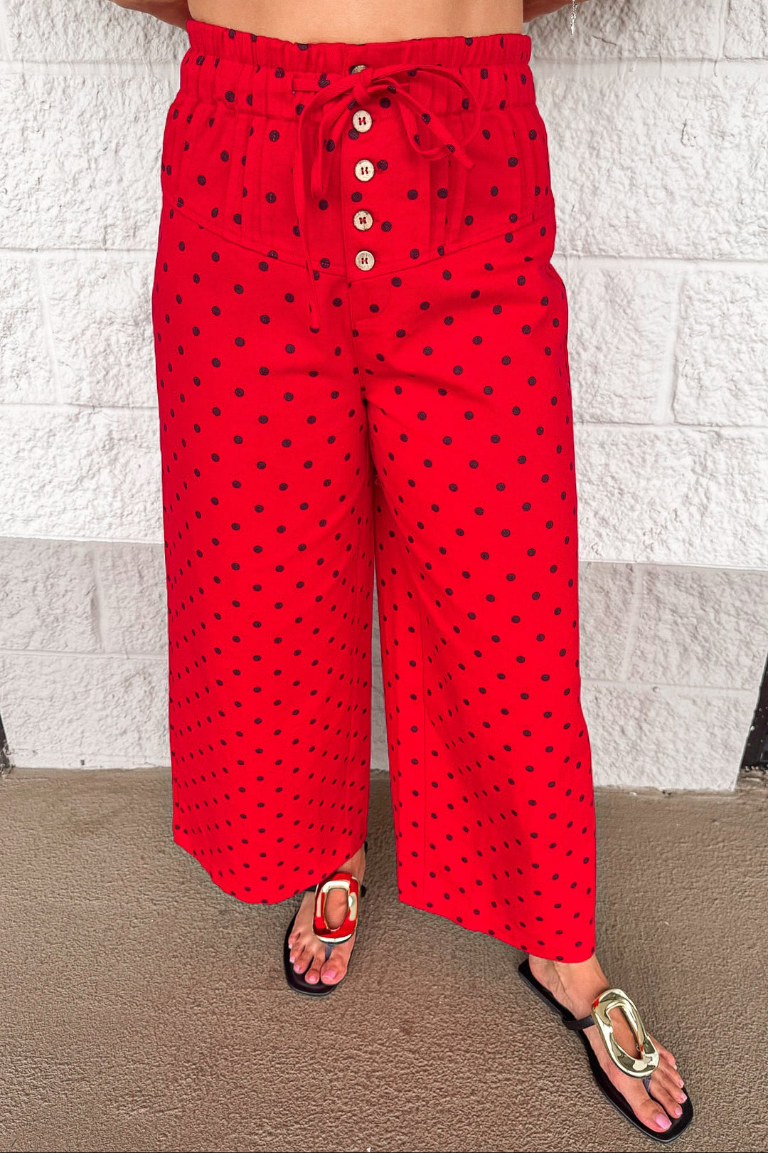 red with black polka dot print drawstring wide leg cropped denim pants