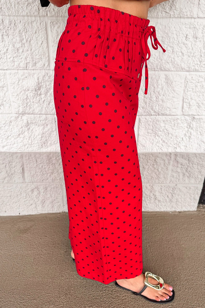 red with black polka dot print wide leg cropped denim pants with pintuck details
