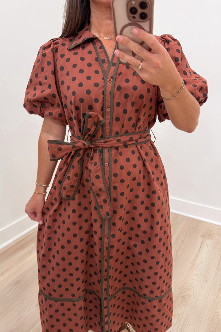 brick red with brown polka dot print puff sleeve collared v neckline button front cotton poplin midi dress