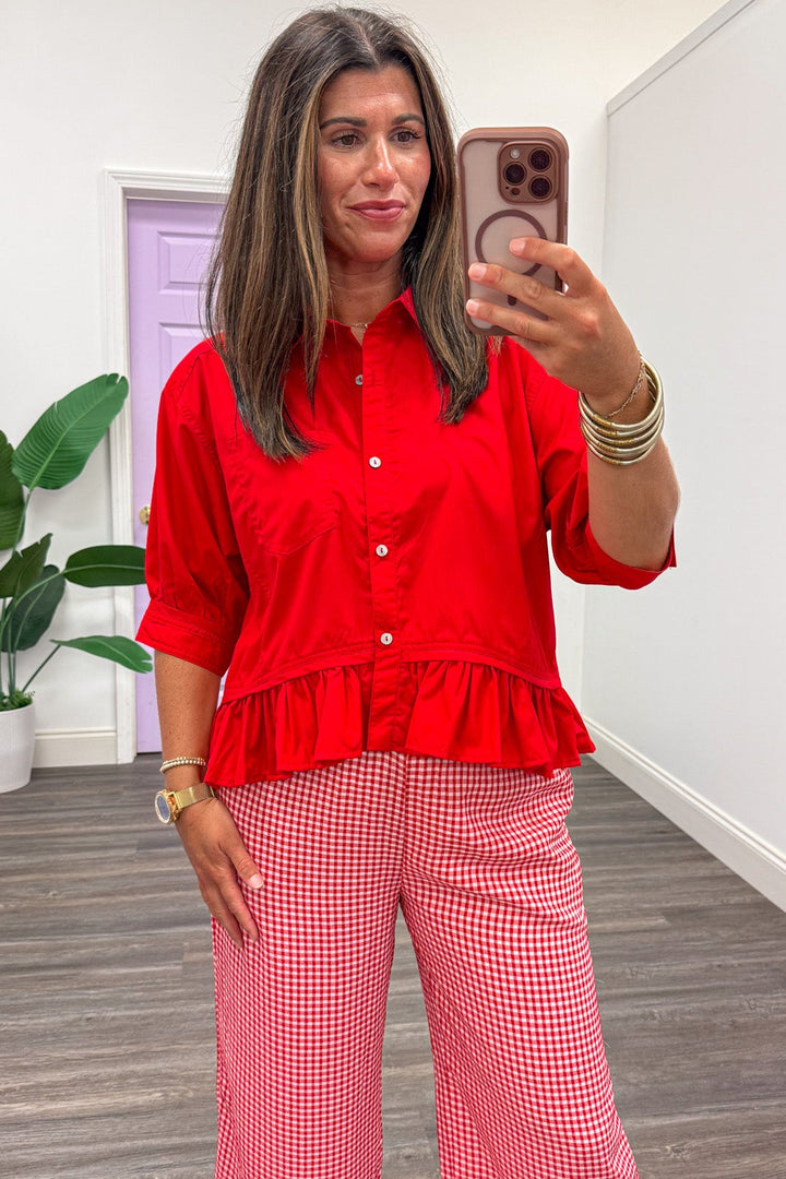 solid red button front puff sleeve ruffle hem semi-cropped peplum top